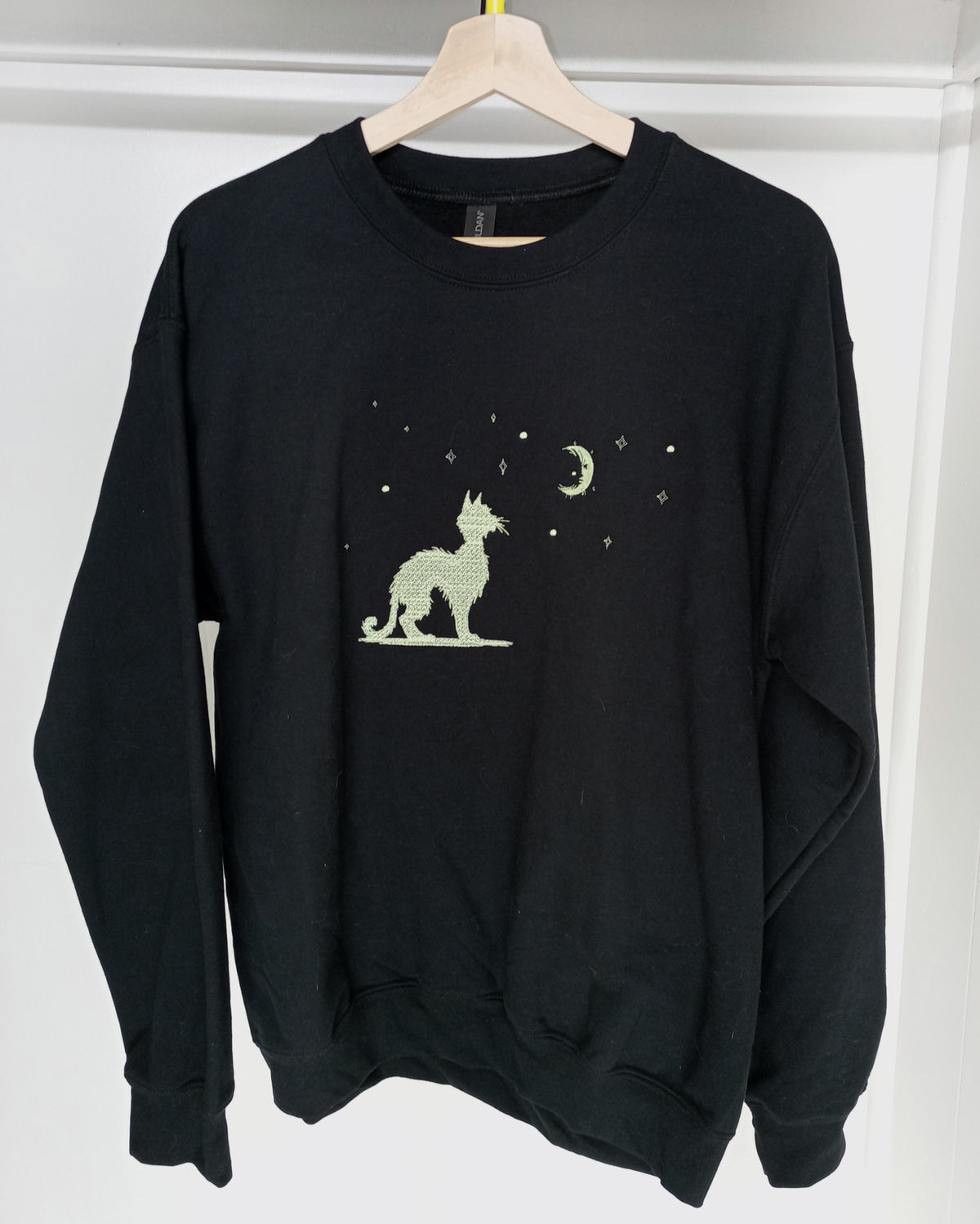 Moonwatch - Glow-In-the-Dark Thread on Black Sweatshirt
