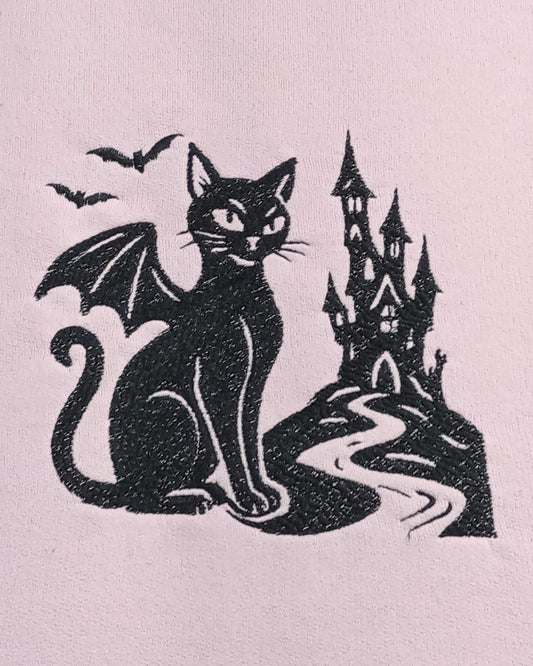 Le Château - Fil noir sur sweat à capuche rose clair