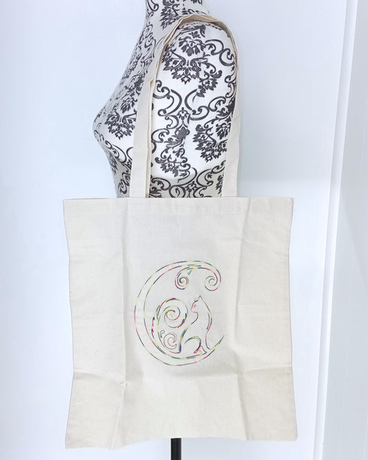 Chat croissant de lune - Fil épais arc-en-ciel sur sac fourre-tout ivoire