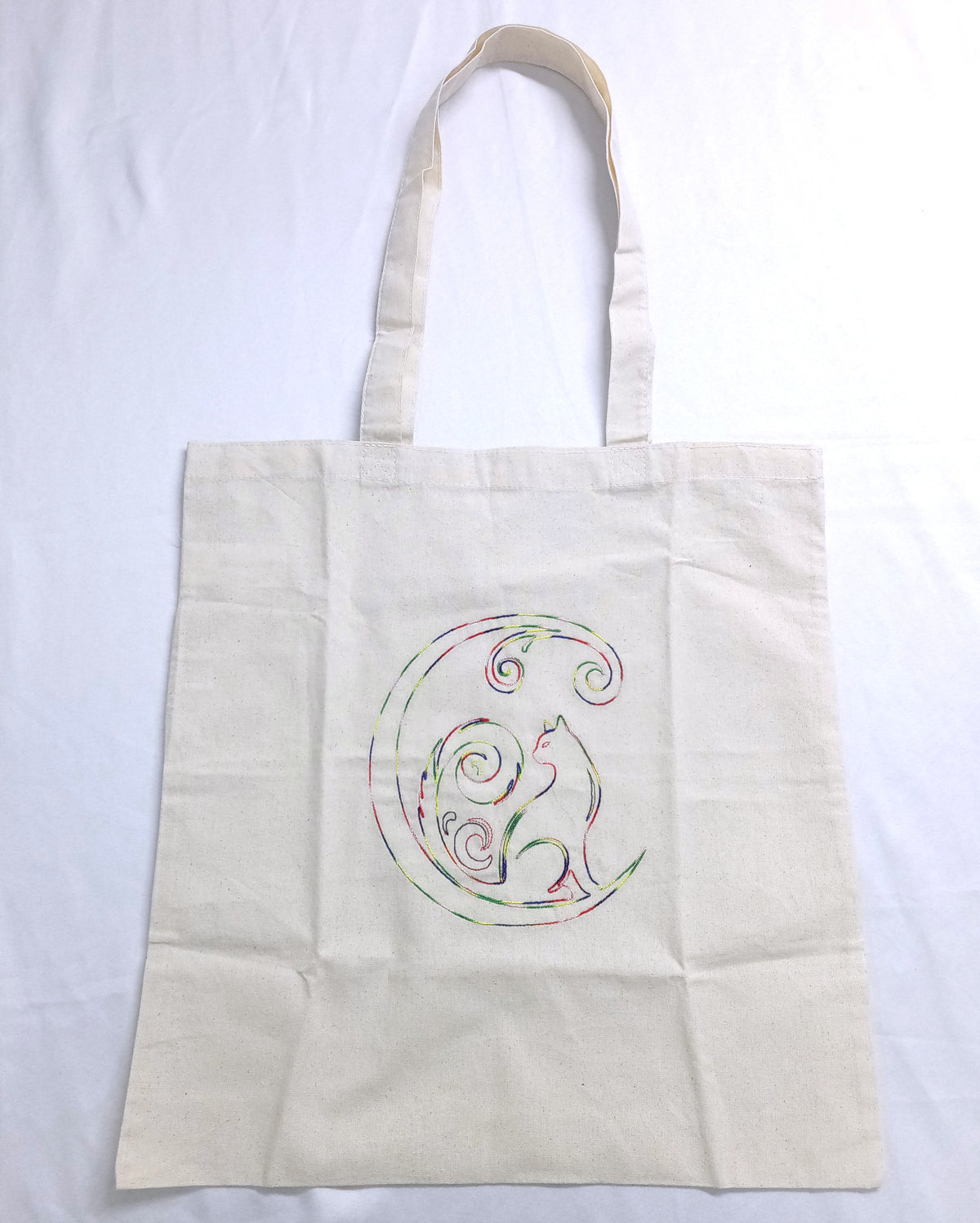 Chat croissant de lune - Fil épais arc-en-ciel sur sac fourre-tout ivoire