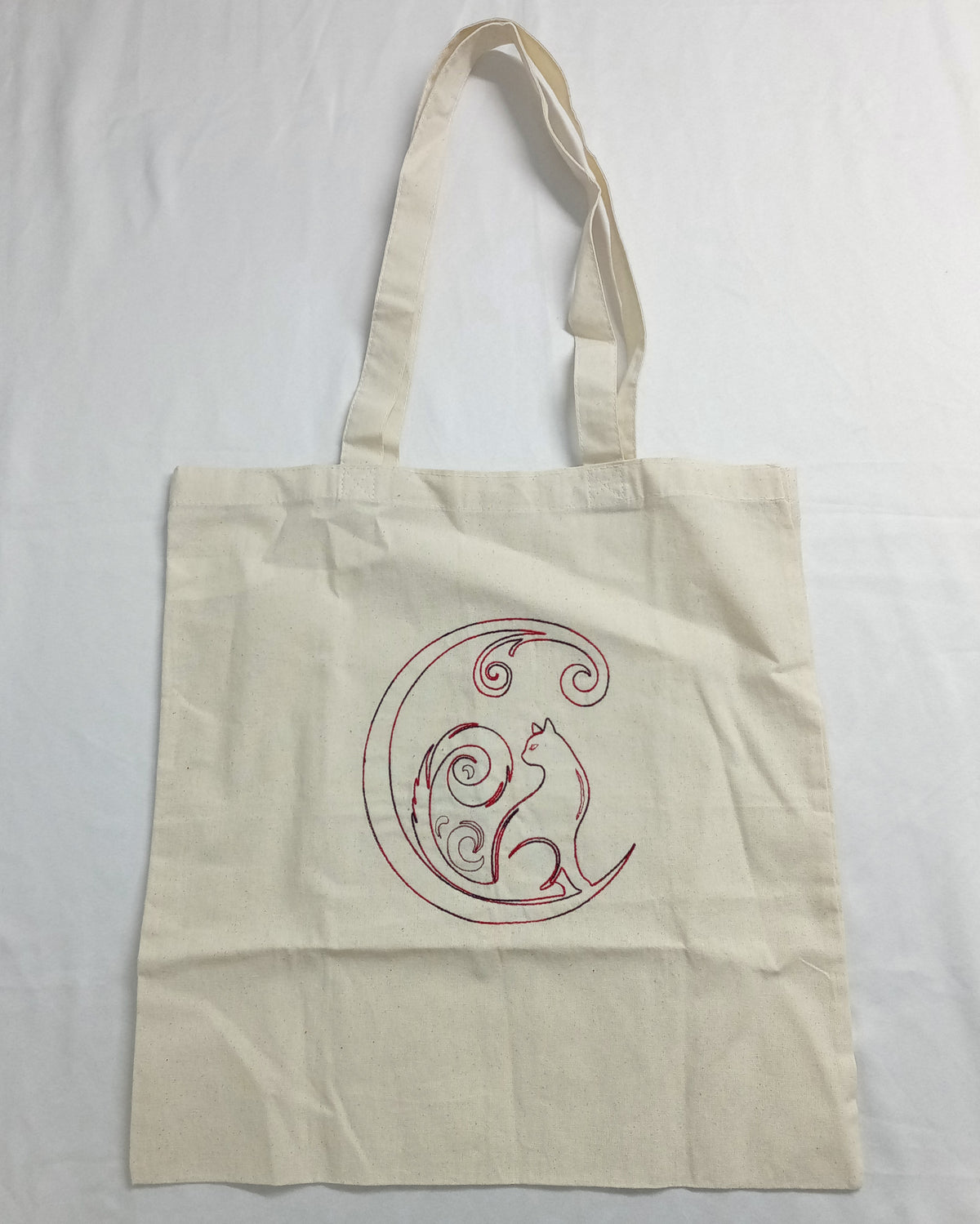 Chat croissant de lune - Fil épais rouge/noir sur sac fourre-tout ivoire
