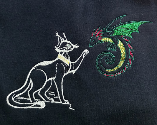 Dragon amical - Blanc et vert sur sweat à capuche noir