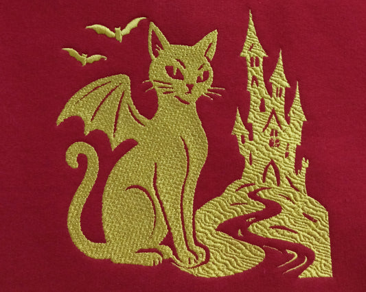 Le Château - Fil doré foncé sur sweat à capuche grenat