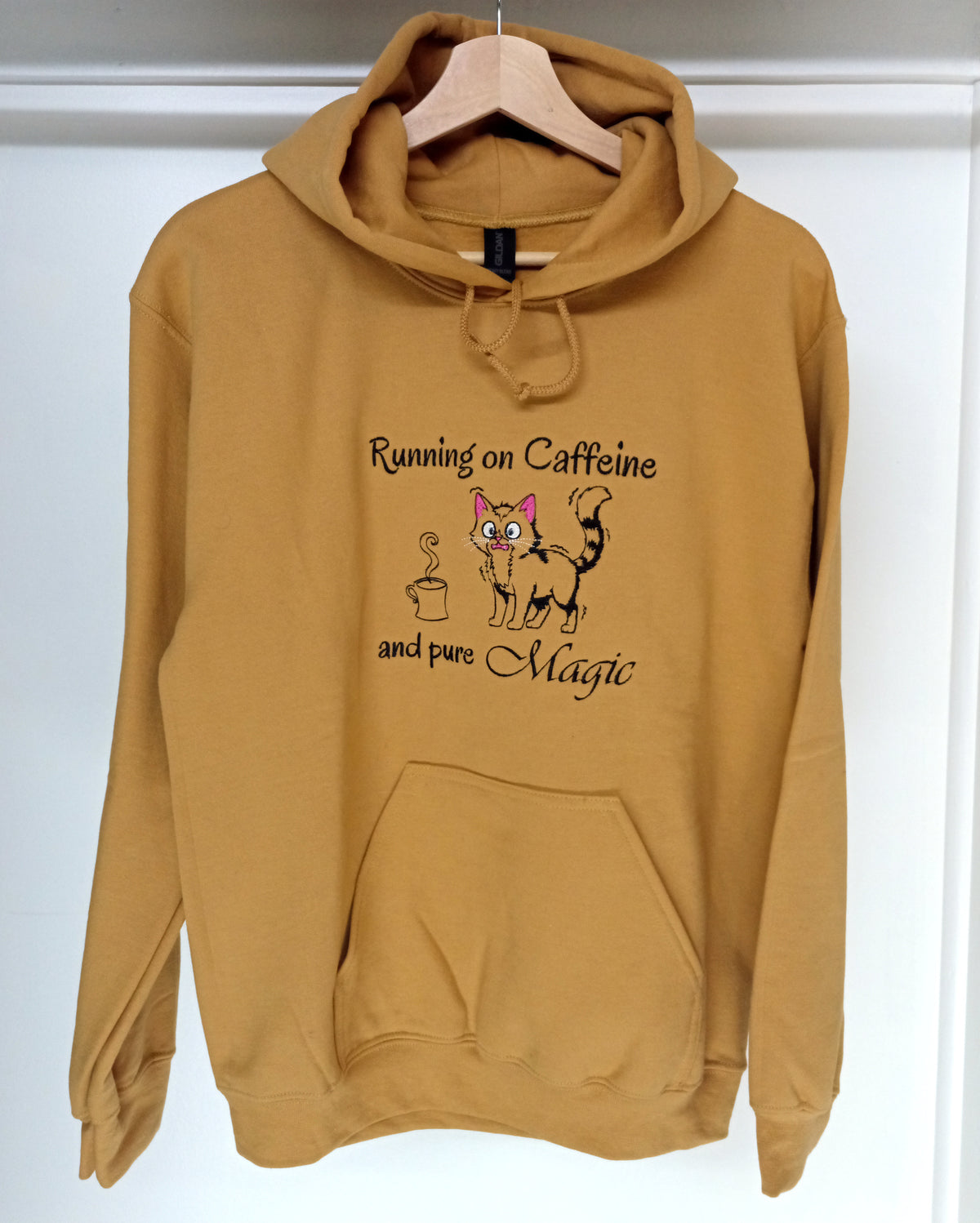 Caféine et magie - Sweat à capuche noir sur moka