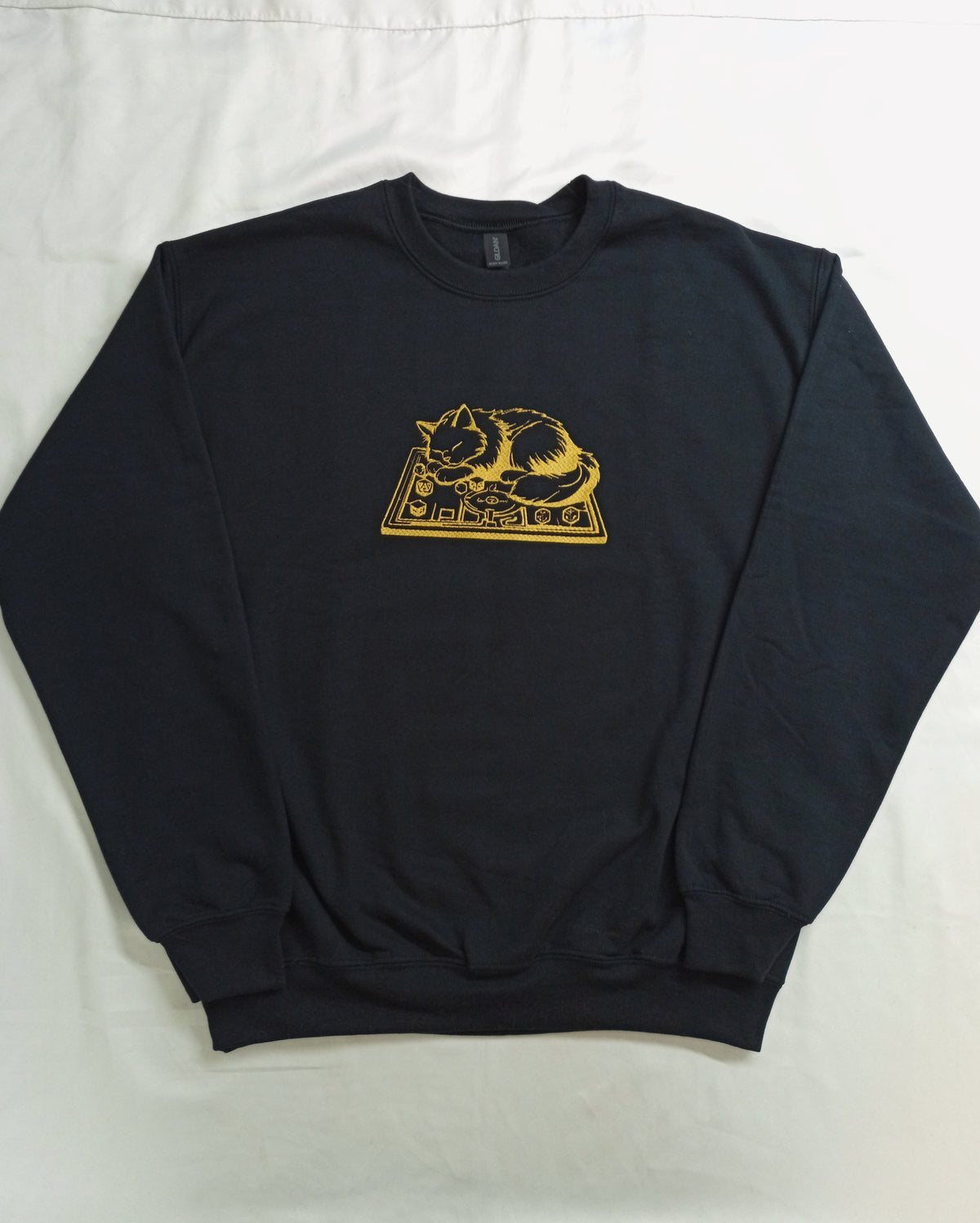 Plateau de jeu - Hoodie noir avec motif doré foncé